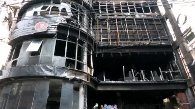 রাজধানীর বেইলি রোডে আগুনে পুড়ে যাওয়া ‘গ্রিন কেজি কটেজ’ ভবন। ফাইল ইমেজ