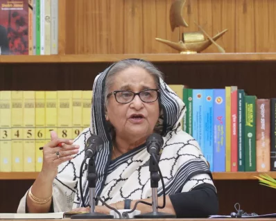 সংবাদ সম্মেলনে বক্তব্য দিচ্ছেন প্রধানমন্ত্রী শেখ হাসিনা। ইমেজ: ইয়াসিন কবির জয়