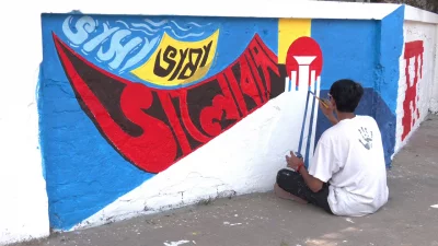 ভাষার ক্যানভাসে পাল্টে গেছে মিরপুরের ২১ দেয়াল